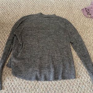 Mock neck long sleeve. Light material, not cropped.